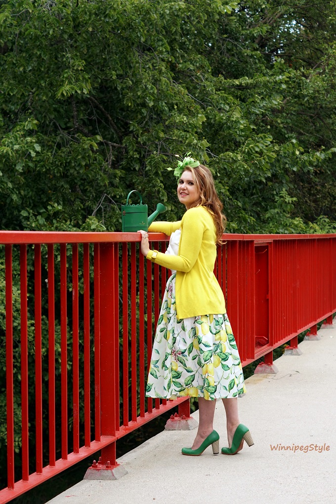 Winnipeg Style, Personal stylist, Chicwish lemon print skirt, Chicwish white bow sweet knot bustier top, Chie Mihara Oki green leather shoes, Precis Petite lime green feather fascinator, Kate Spade spring forward watering can bag purse